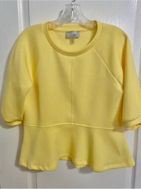 Cupio Blush Light Yellow Peplum Top